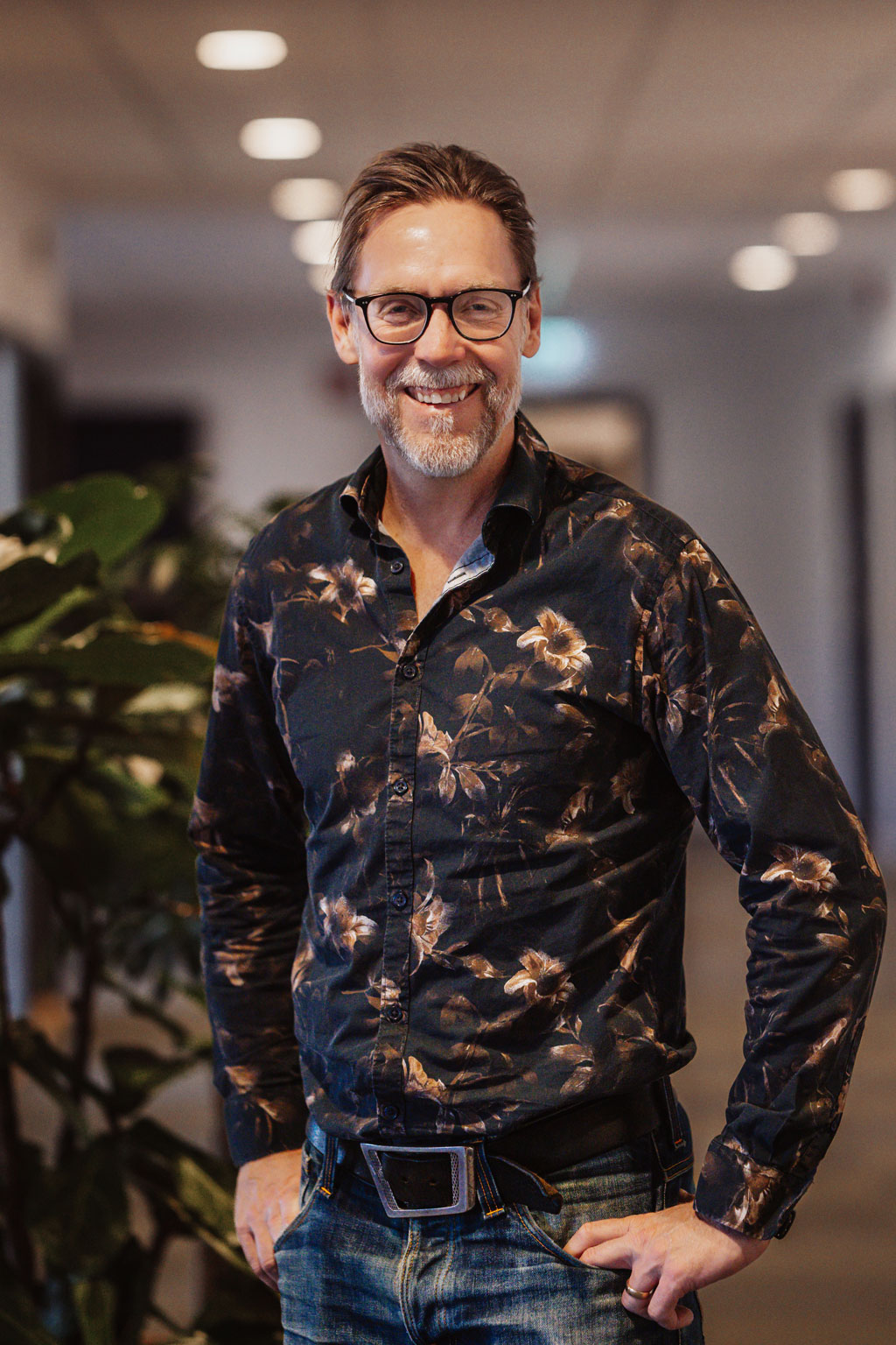 guy-playing-an-ukelele-in-a-chair